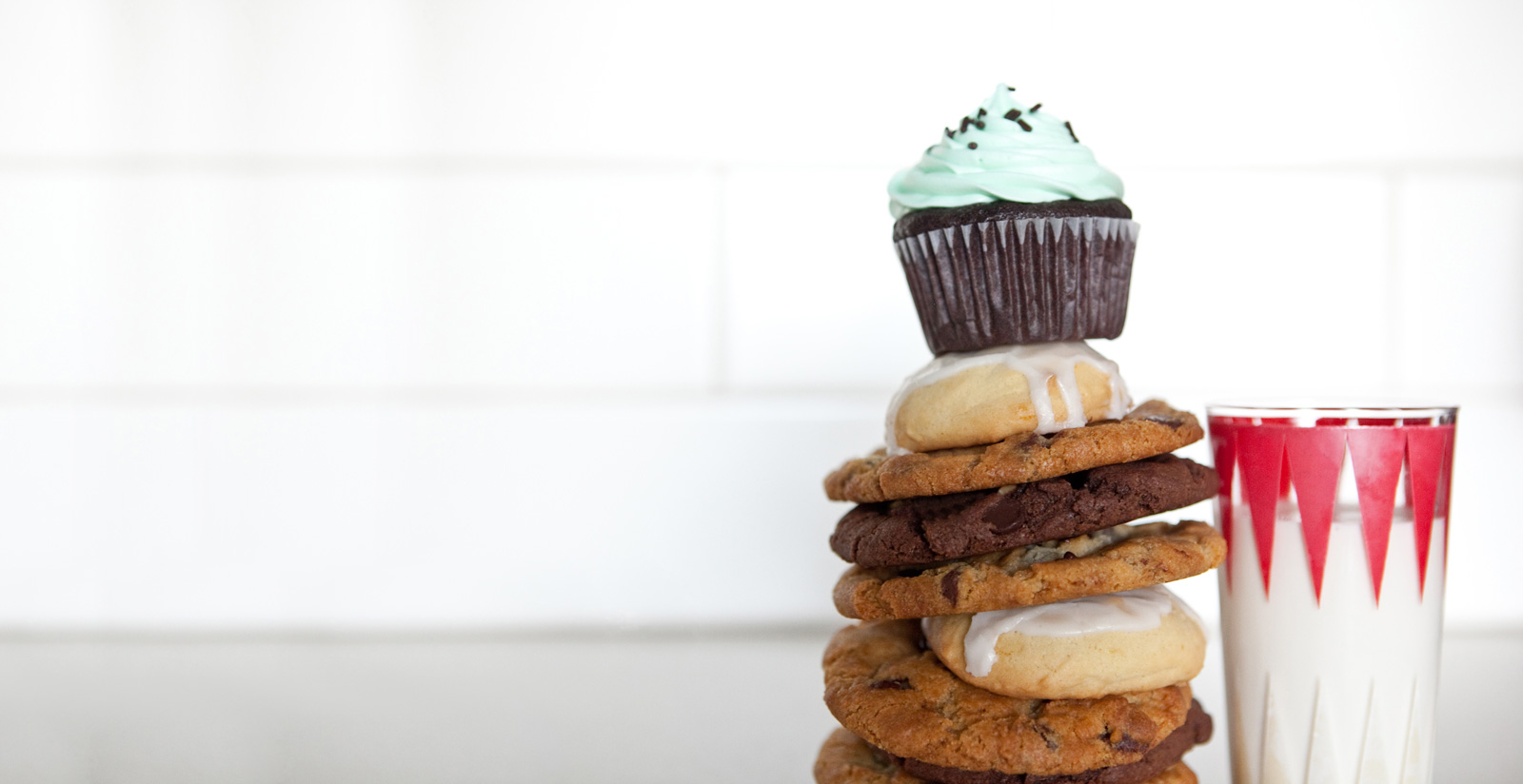 Stack of tasty cookies and treats (with cold milk of course)